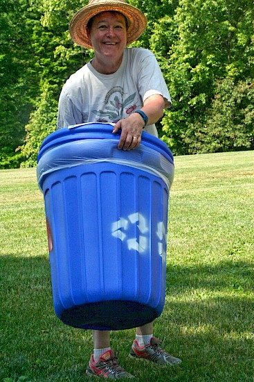 Putting a recycling bin in place